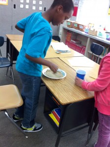 Fifth graders making Martian sand2