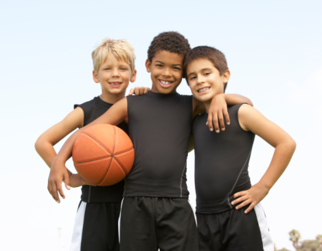 Young Boy Playing Basketball