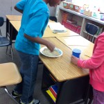Fifth graders making Martian sand2